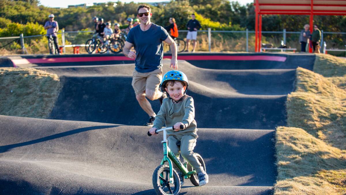Three-year-old Flynn Travis and his dad Chris Travis enjoying the track. Picture supplied 