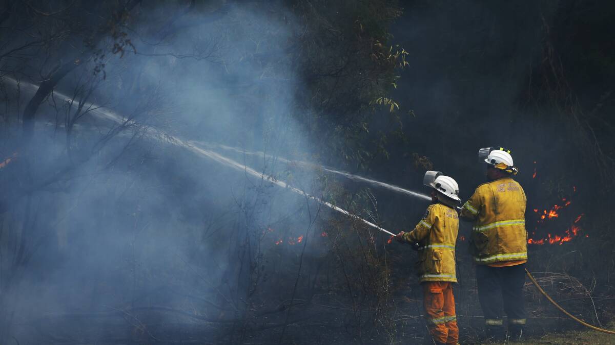 Back burning continued along Kearsley and Lake roads on Wednesday. Pictures by Simone De Peak