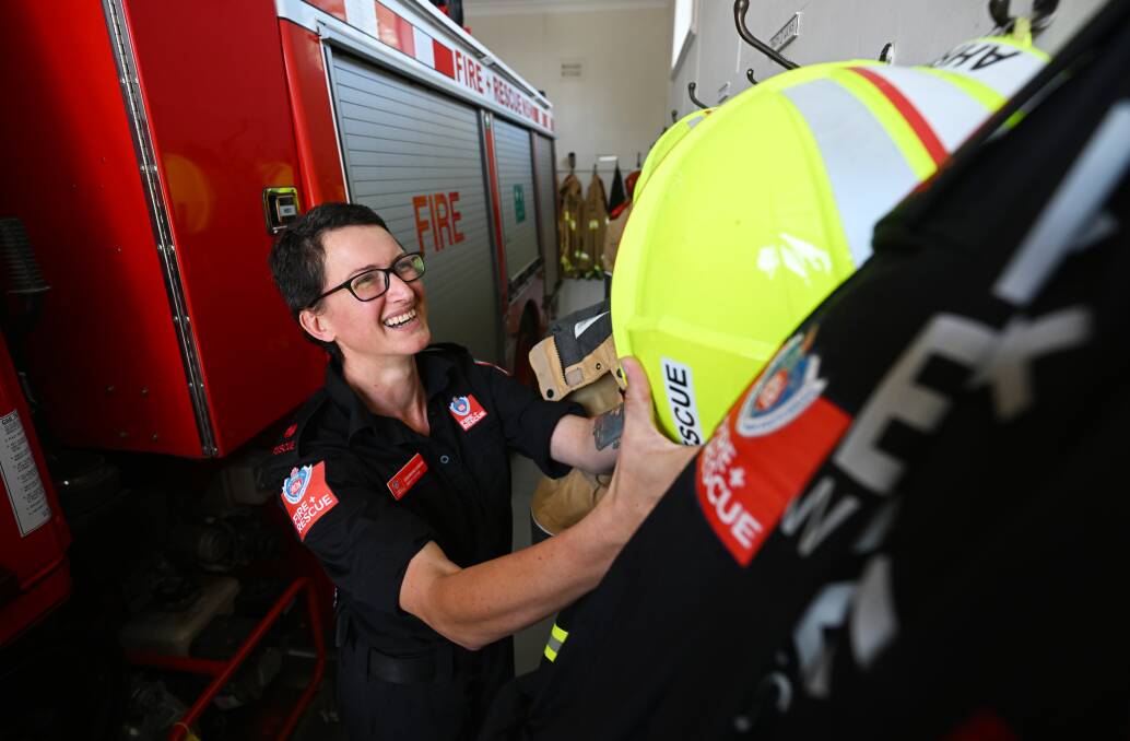 The single mother of three children has redefined stereotypes and shown the strength of female firefighters. Picture by Gareth Gardner