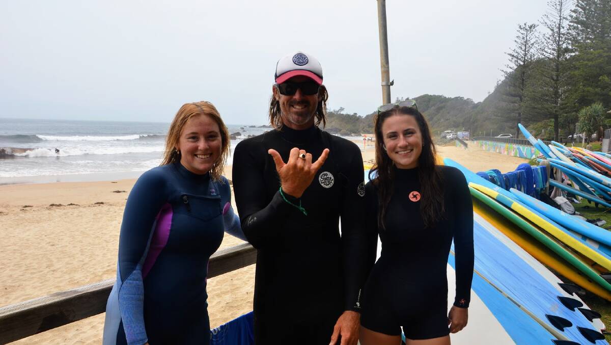 Auraiha Hewen, Wayne Hudson, and Emma Marchant from the Port Macquarie Surf School at Flynns Beach on Tuesday, November 28. Picture by Emily Walker