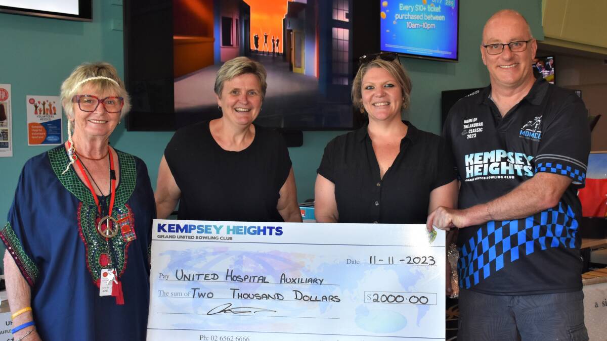 Kempsey Heights Bowling Club manager Kerr Black presents a donation to UHA president Maxine Walker, Kempsey District Hospital executive officer Katie Croad, and director of nursing Donna Kennedy. Picture supplied