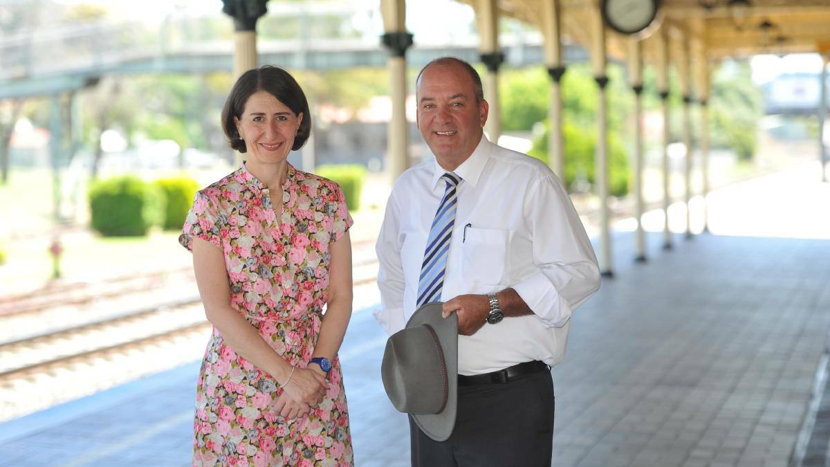 Then-NSW transport minister Gladys Berejiklian and former Wagga MP Daryl Maguire at Wagga railway station in 2015. Picture by Les Smith