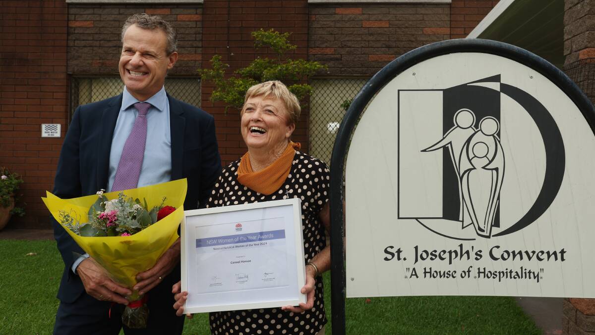 Member for Newcastle, Tim Crakanthorp awarded House of Hospitality founder and coordinator Sister Carmel Hanson RSJ Newcastle Woman of the Year. Picture Simone De Peak