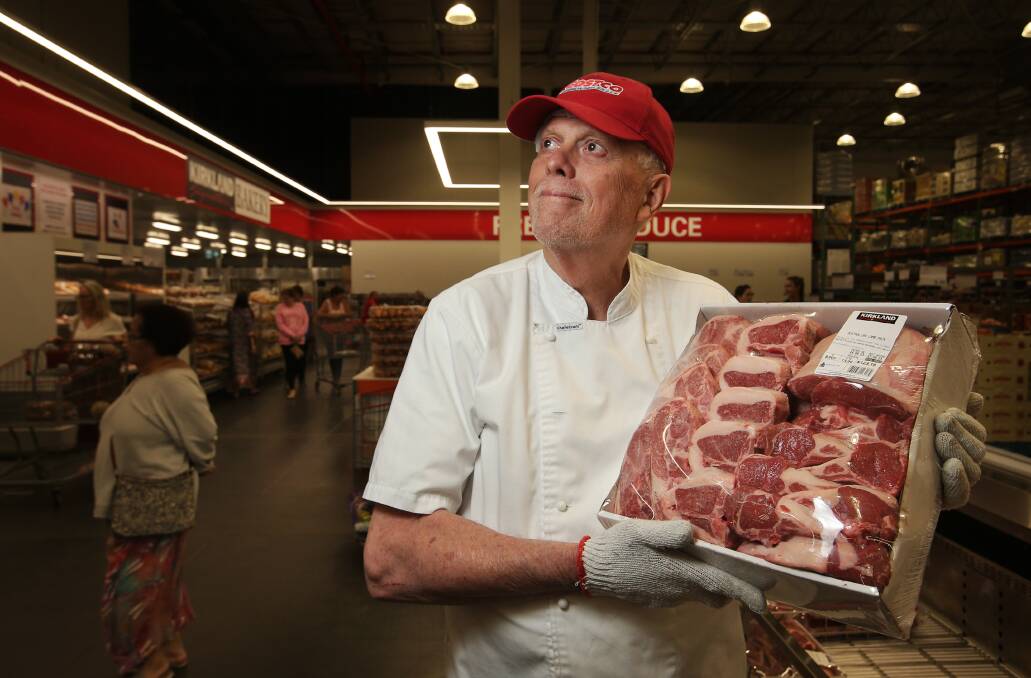 Donald Moore, assistant in the meat department with an Australian lamb pack. He says, "the lamb packs fly out the door". With a unit price of $13.99 per kilo, the lamb pack includes "pretty much a half of lamb," he says. Picture by Simone De Peak