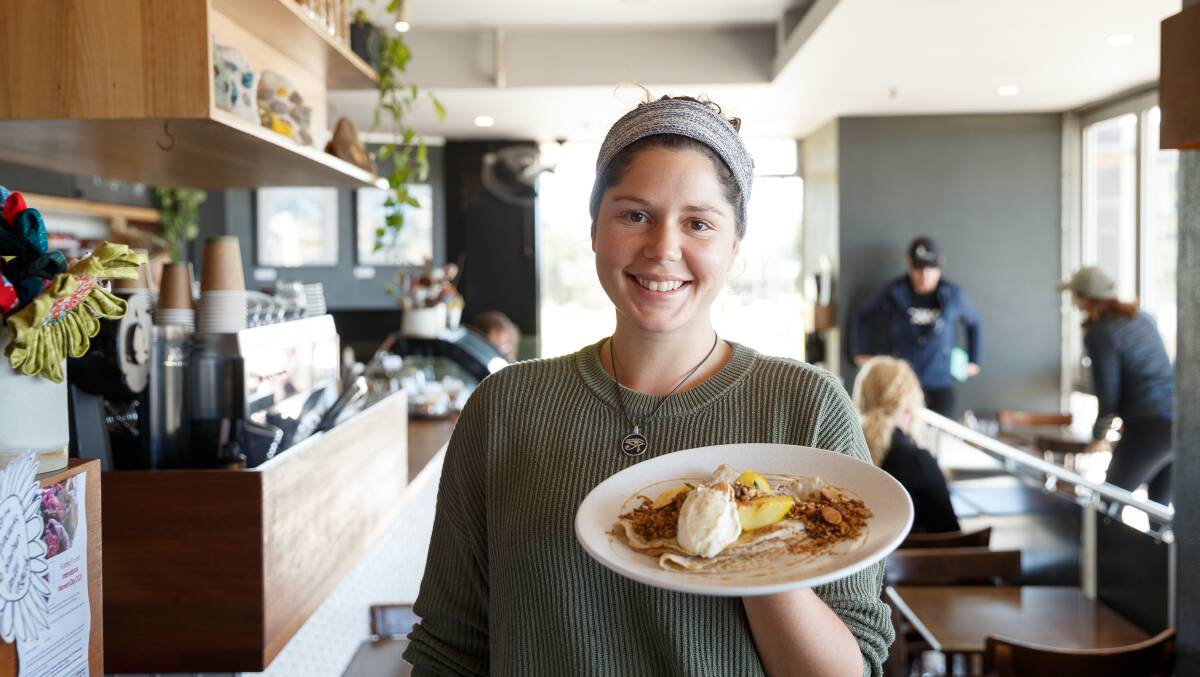 So popular: Taylor Hunt at Estabar with buckwheat pancakes with poached pear and vanilla ricotta. Picture: Max Mason-Hubers