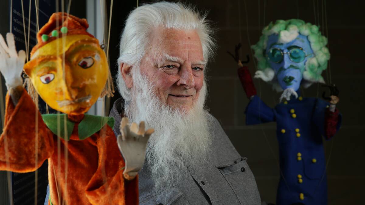 Wizardry: Frank Oakes with one of his puppets on display at Maitland Regional Art Gallery. Picture: Simone De Peak