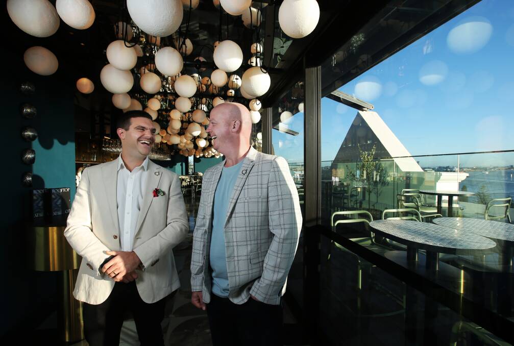 CHOICE LOCATION: QT Newcastle general manager Michael Stamboulidis and Callum Kennedy, group general manager QT Hotels & Resorts, at the Rooftop Bar in Newcastle on Tuesday. Picture: Simone De Peak