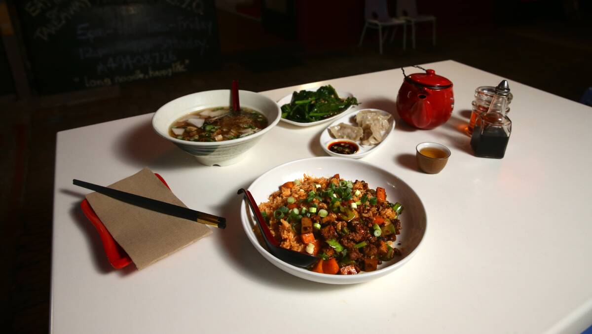 On the table:The dumplings are a 4-piece serve of chicken and mushroom, the greens are Jie Lam in garlic and oyster sauce, the rice dish is MapoTofu and the noodles are the tofu and mushroom in veg broth. Picture: Jonathan Carroll