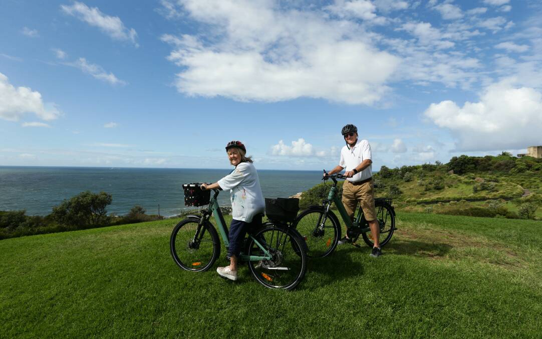 Keeping in shape: Marilyn and Mark Oughton on their e-bikes at King Edward Park. Picture: Jonathan Carroll