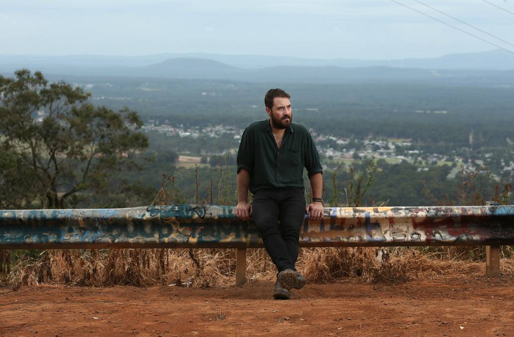 Above the din: William Crighton at a lookout in the Hunter Valley. Picture: Simone De Peak