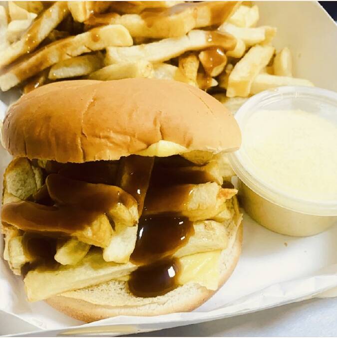 Vinny's Takeaway: Hand-cut chips on a classic burger bun with chips and gravy.
