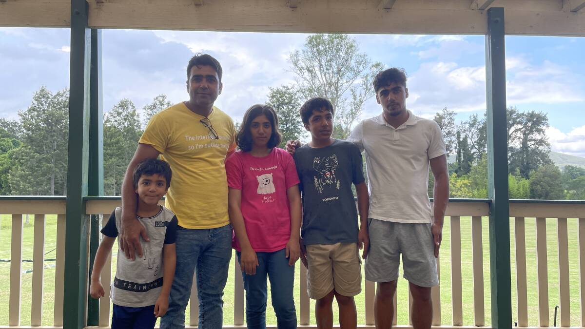 Darwish Ahmadzai and his children Yasar, Madina, Ahmad Zia and Ahmad Sohail are now living in Dungog. Picture by Angus Michie.