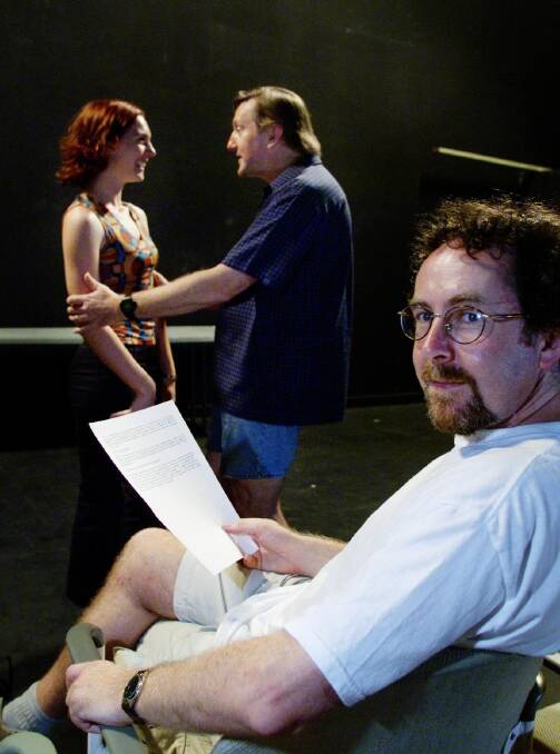 On the job: Carl Caulfield in the foreground with actors Bethany Jones and Barry Shepherd at the Civic Playhouse in 2006. 