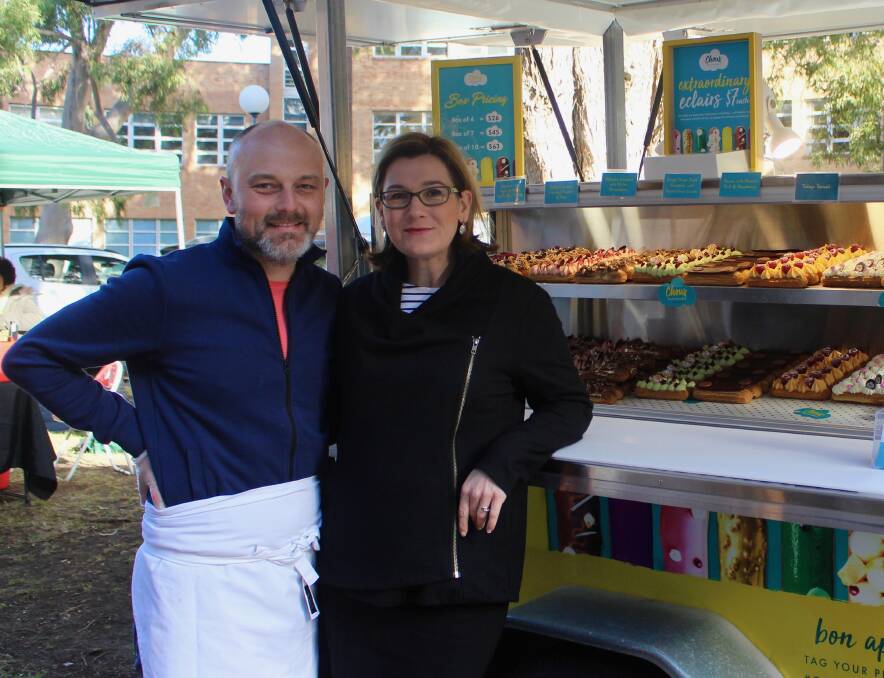Eclair expertise: Nic Poelaert and his wife Tara at their Choux Patisserie stall. Pictures: Daniel Honan.
