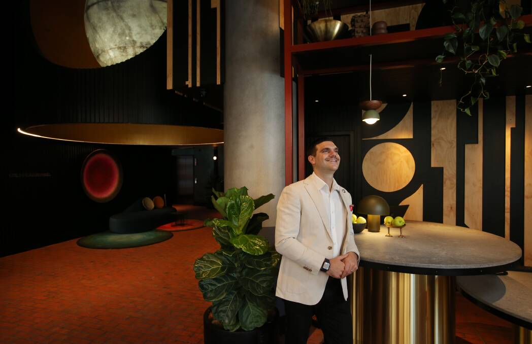Michael Stamboulidis in the lobby of QT Newcastle on the day before it opened in June 2022. Picture by Simone De Peak 