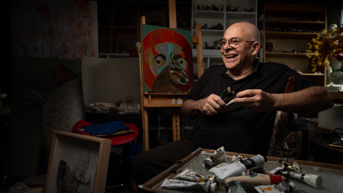 Keen imagination: Trevor Weekes in his Sandgate studio where he creates and stores a trillion images and items. Picture: Marina Neil 