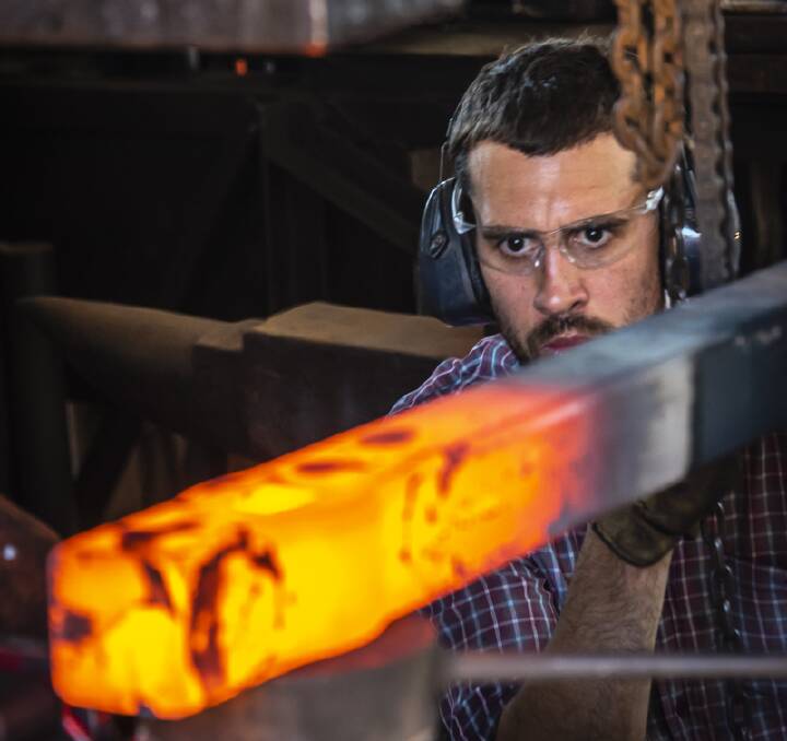 JOURNEY MAN: Will Maguire at the forge. Picture: Dennis Archibald