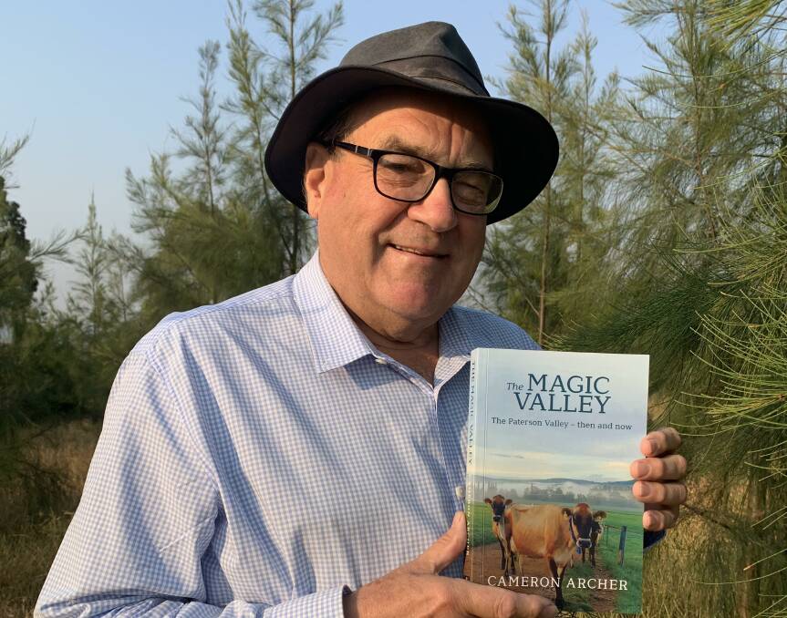 Instant classic: Author Cameron Archer pictured with his new book about the history of the Paterson Valley.
