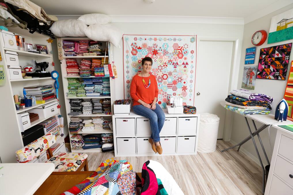 Colour galore: Catherine Mosely in her workshop at her Cameron Park home. Picture: Jonathan Carroll