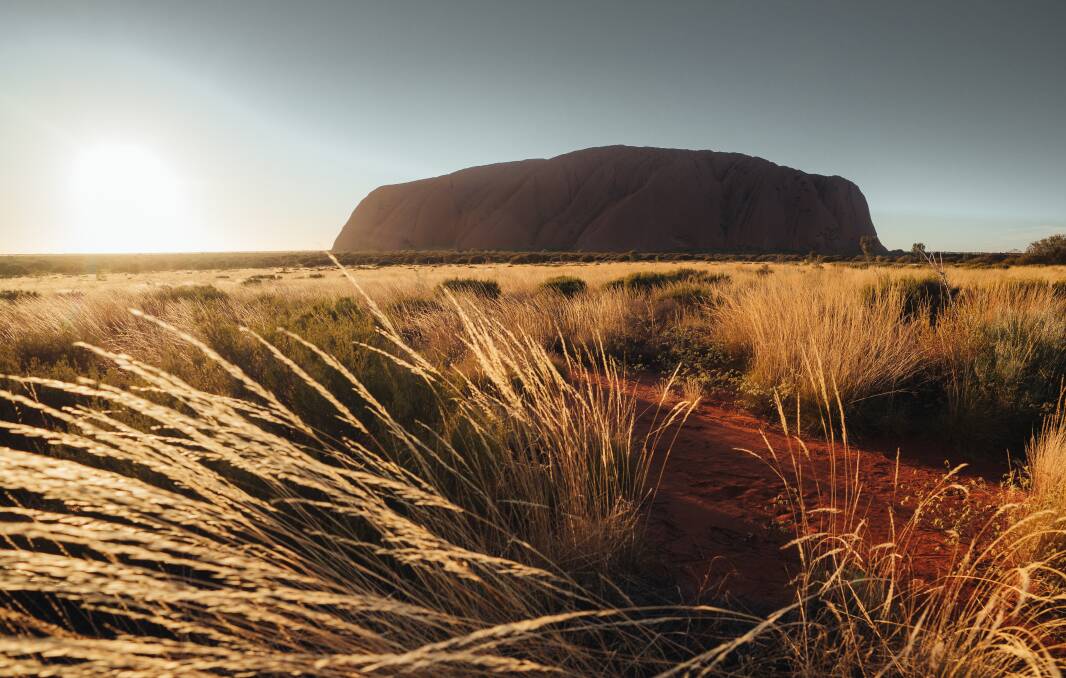 The big attraction: Uluru, the remarkable sandstone formation rises 384 metres out of the desert. Picture: Northern Territory Tourism
