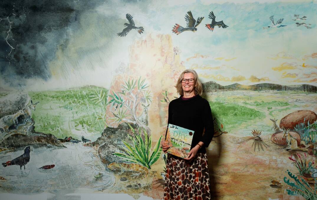 Colourful adventure: Liz Anelli in front a print at her Dry to Dry exhibition about Kakadu National Park at Lovett Gallery upstairs in the Newcastle City Library on Laman Street. Picture: Max Mason-Hubers