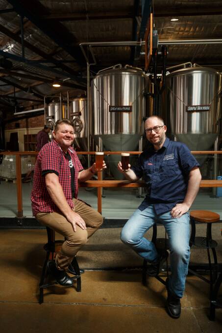 United in the effort to make better beer: The Grain Store craft beer restaurant owner Corey Crooks and Foghorn Brewhouse owner/brewer Shawn Sherlock.