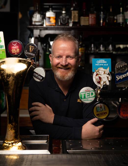 Born to run pubs: Stephen Hunt at the beer taps at The Kent hotel this week. (Picture by Marina Neil).