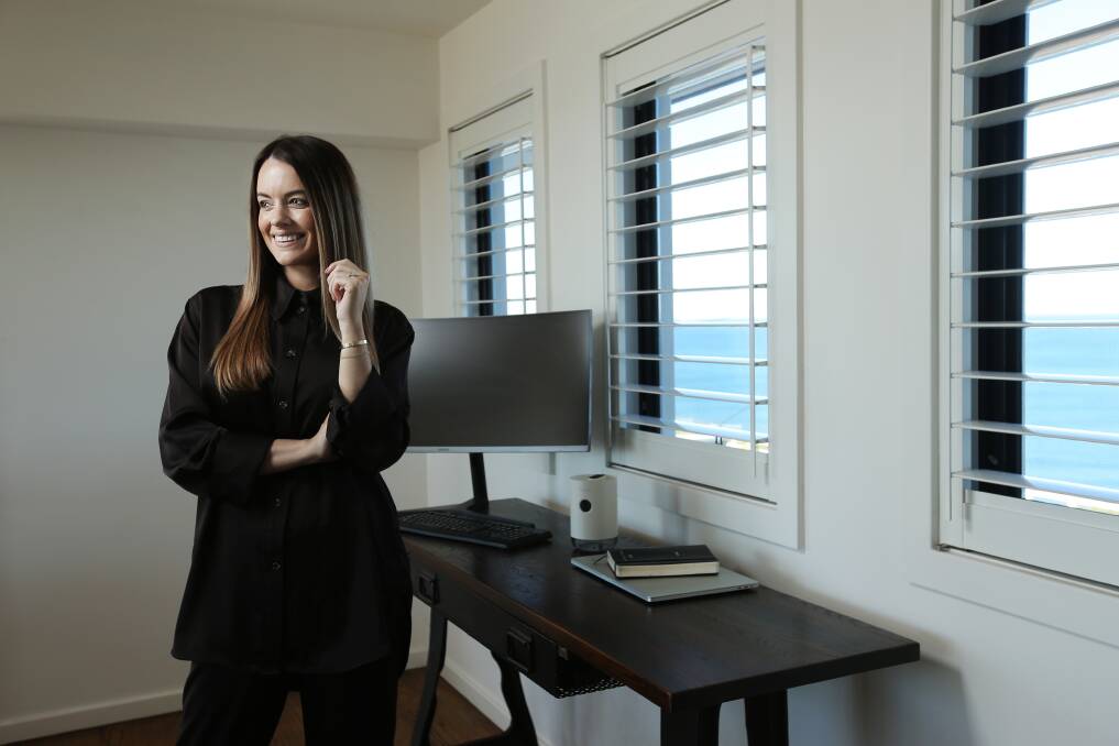 High energy: Madeline Fitzgibbon with her product, the Humidi, on the desk behind her. Picture: Simone De Peak