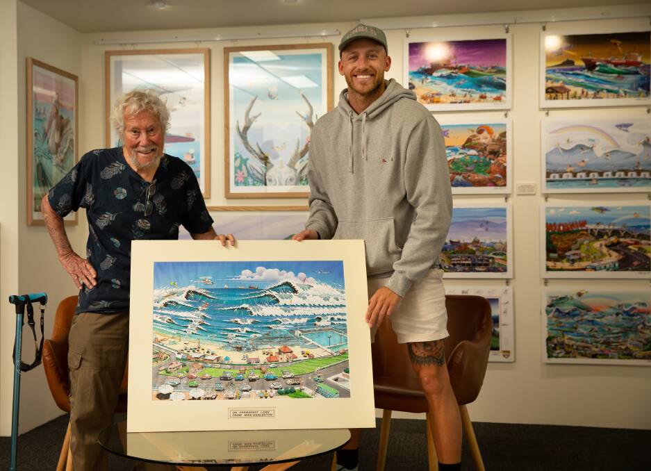 Born again: Mick Eggleston and Mitch Resevsky in Revs gallery, with Eggleston's original 1988 Merewether Beach poster artwork. A limited edition of 100 new prints signed by Eggleston are coming soon. Picture: Marina Neil