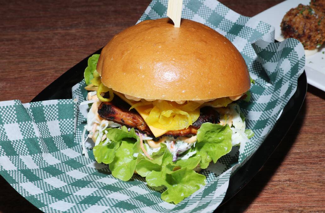 TASTY: The Korean chicken Burger at Norma's Bistro at Alder Park Sports Club in New Lambton. Pictures: Peter Lorimer.