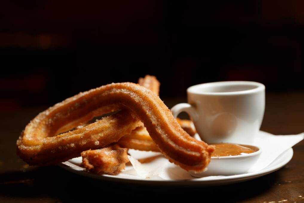 Take a bite: The awesome churros at Bocados, which celebrated 10 years of business this year. It's one of 44 restaurant reviews in Saturday's 4th annual special Food Issue of Weekender. Picture: Max Mason-Hubers