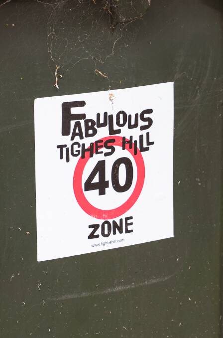 Community spirit: The 40kmh stickers on garbage bins. Picture: Mick Ross 