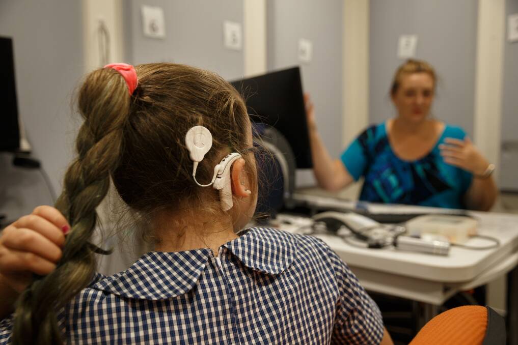Check-up: Abbi Keating at the Sydney Cochlear Implant Centre's office in Newcastle this month. Picture: Max Mason-Hubers