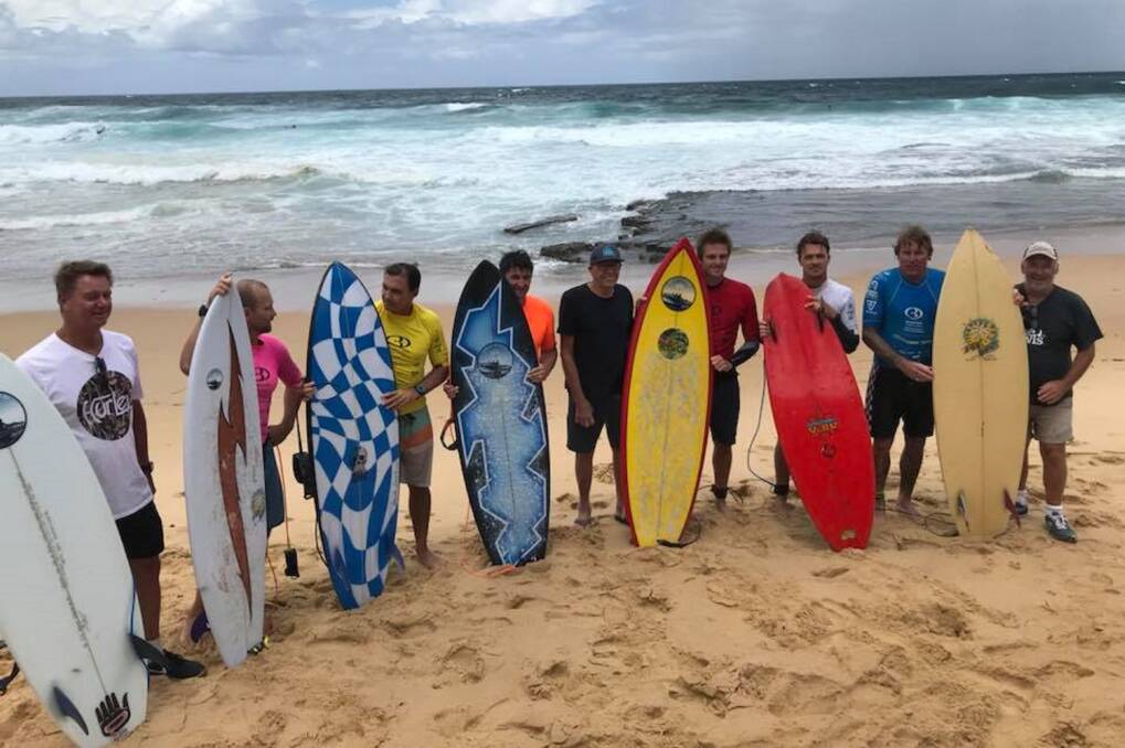 Board warriors: At left, shapers and surfers at the 2018 King of the Rocks event at Merewether: Greg Antcliff, Jye Byrnes, Paul Snow, Travis Lynch, Sam Egan, Ryan Callinan, Jackson Brent, Matt Hoy, Peter McCabe. Above, shapers Jye and Mick Byrnes.