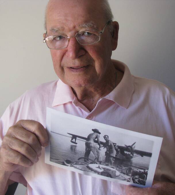 LEST WE FORGET: Jack Carter, 93, has a huge collection of rare and precious photographs which document his time in the country's north where he served in WWII.