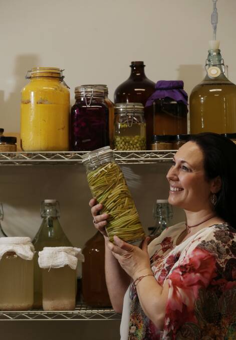 Wide range: Jane Jenkinson with some of products fermenting in the Wholefood Family kvassaria Broadmeadow. Picture: Simone De Peak