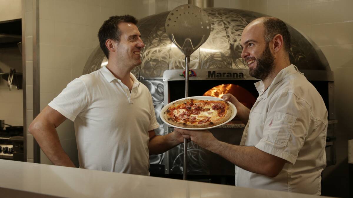 Bella Italia: Business partners Andrea Dazzi and Nico Gentile at their new Hunter Street restaurant. Picture: Simone De Peak