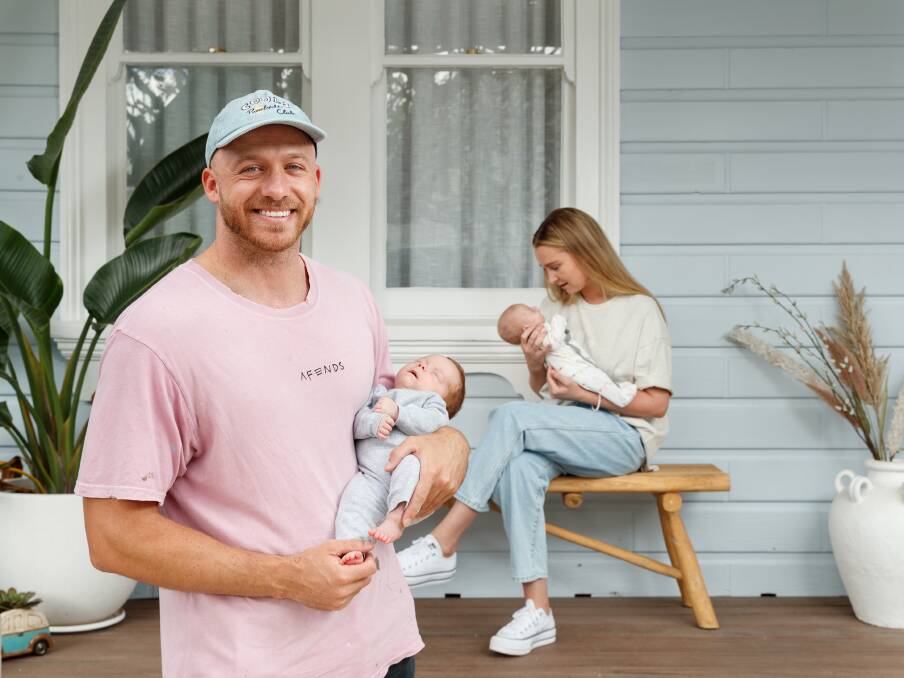 Home sweet home: Mitch and Emily with Bobbi and Bodhi at home in The Junction. Picture: Max Mason-Hubers