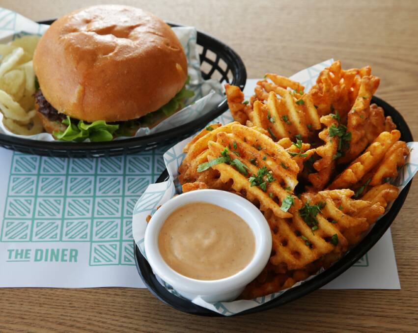 YUM: The Diner Classic Burger and waffle fries with chipotle mayo. 