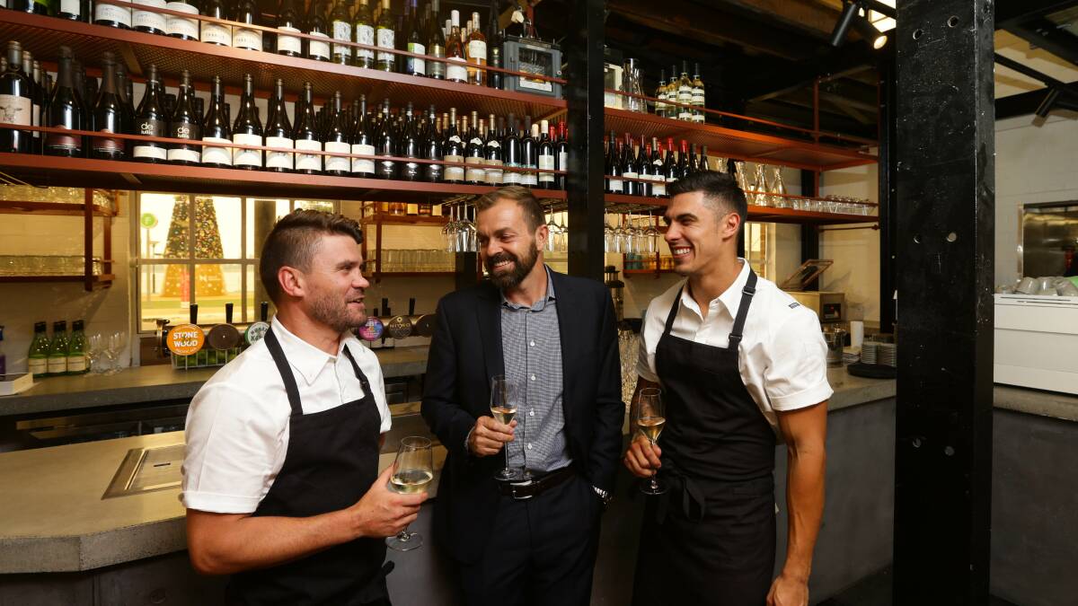 The team: Chefs Dan James (left) and George Mirosevich (right) with Andrew Macdonald at The Signal Box. Picture: Jonathan Carroll