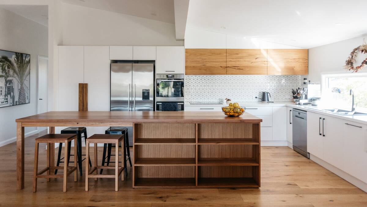 Woodworker's Cottage: A stunning Blackbutt timber island makes the kitchen come alive.