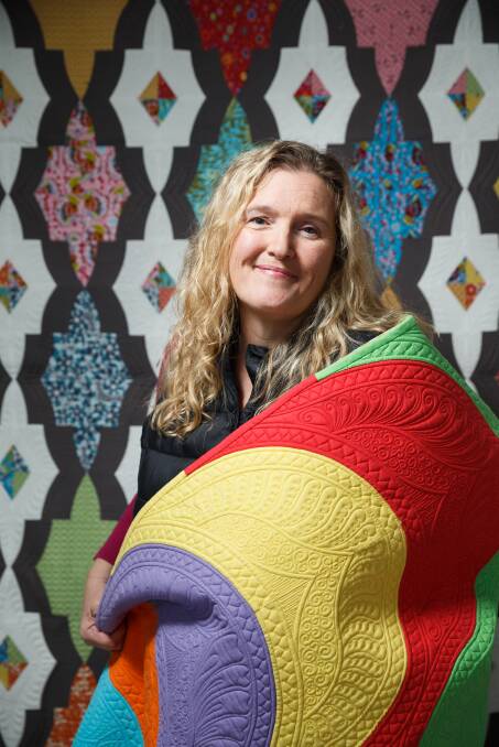 Mt Vincent quilter Leanne Harvey with one of her quilts. Picture: Max Mason-Hubers