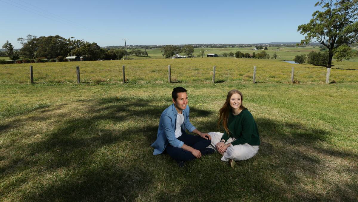 Home: Asif Sultani and his wife, Grace, in Maitland. Picture: Jonathan Carroll