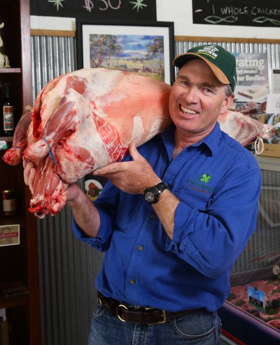 Grassfed: Dave Carter with a lamb carcase. Picture: Jonathan Carroll