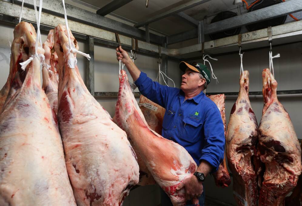 Maxiimising opportunity: David Carter with carcases at his Morpeth Butchery. Pictures: Jonathan Carroll