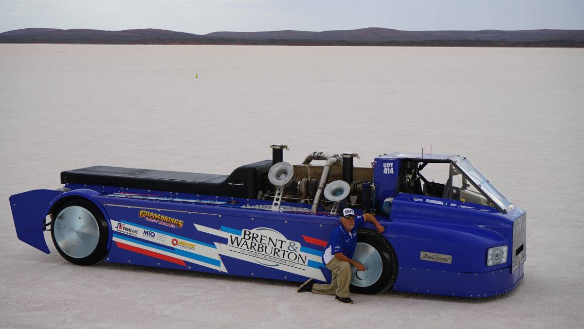 Mean machine: Gavin Manning with his hybrid racing truck, Diesel Arrow, at Lake Gairdner.