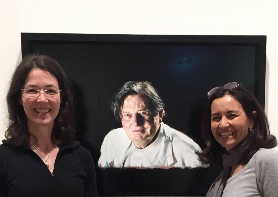 Talking with Painters: Louise Hearman, left, and her Archibald winning painting of Barry Humphries, with Maria Stoljar.