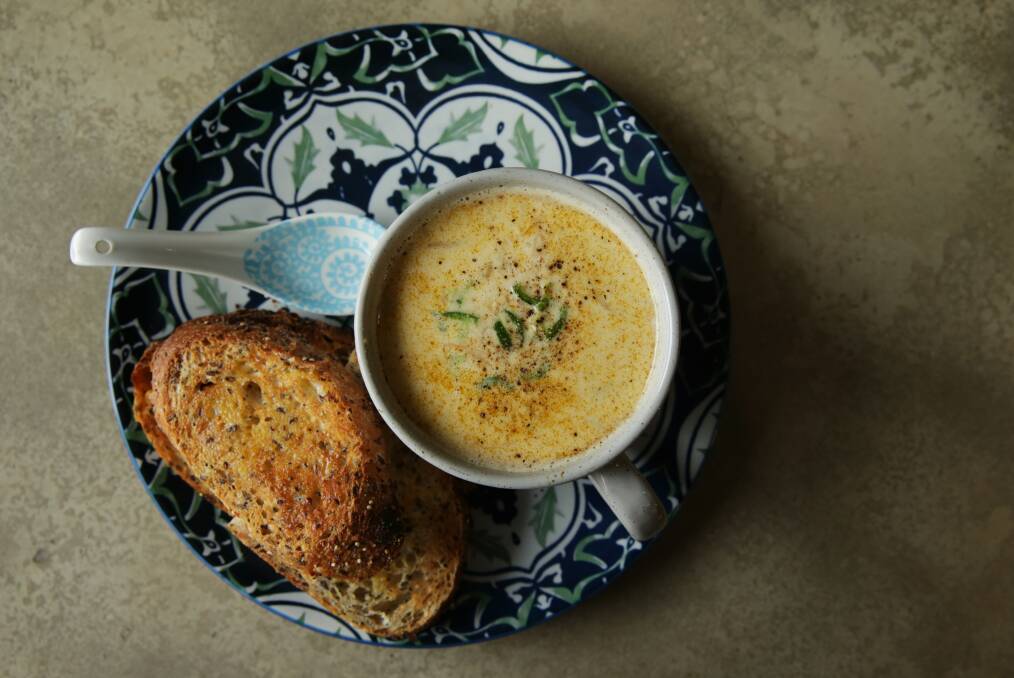 WHOLESOME BEAUTY: The chicken, coconut and kaffir lime soup from Merewether's Akuna Cafe. Photo: Simone De Peak