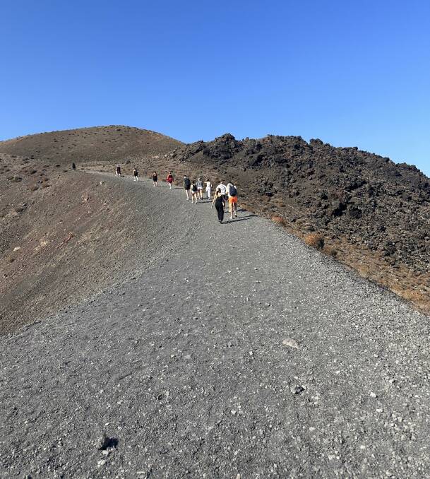 Trekking up to the volcano on Thirassia in Greece. Picture by Daniel Scott