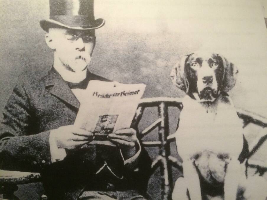 Legend: Architect Frederick Menkens seen with his dog Mick.